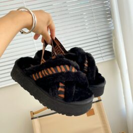 UGG sheepskin and fur slippers with black stripes