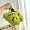UGG sheepskin and fur slippers with green stripes